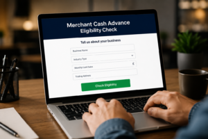 Laptop screen showing a merchant cash advance eligibility check for a UK small business
