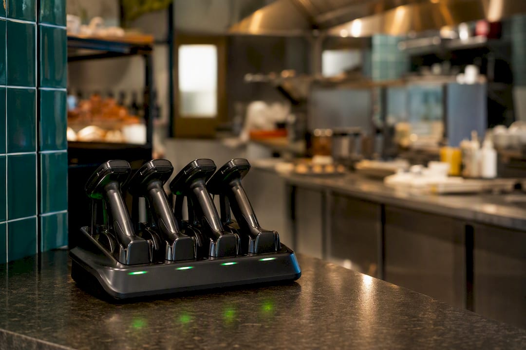 Wireless barcode scanners charging in dock